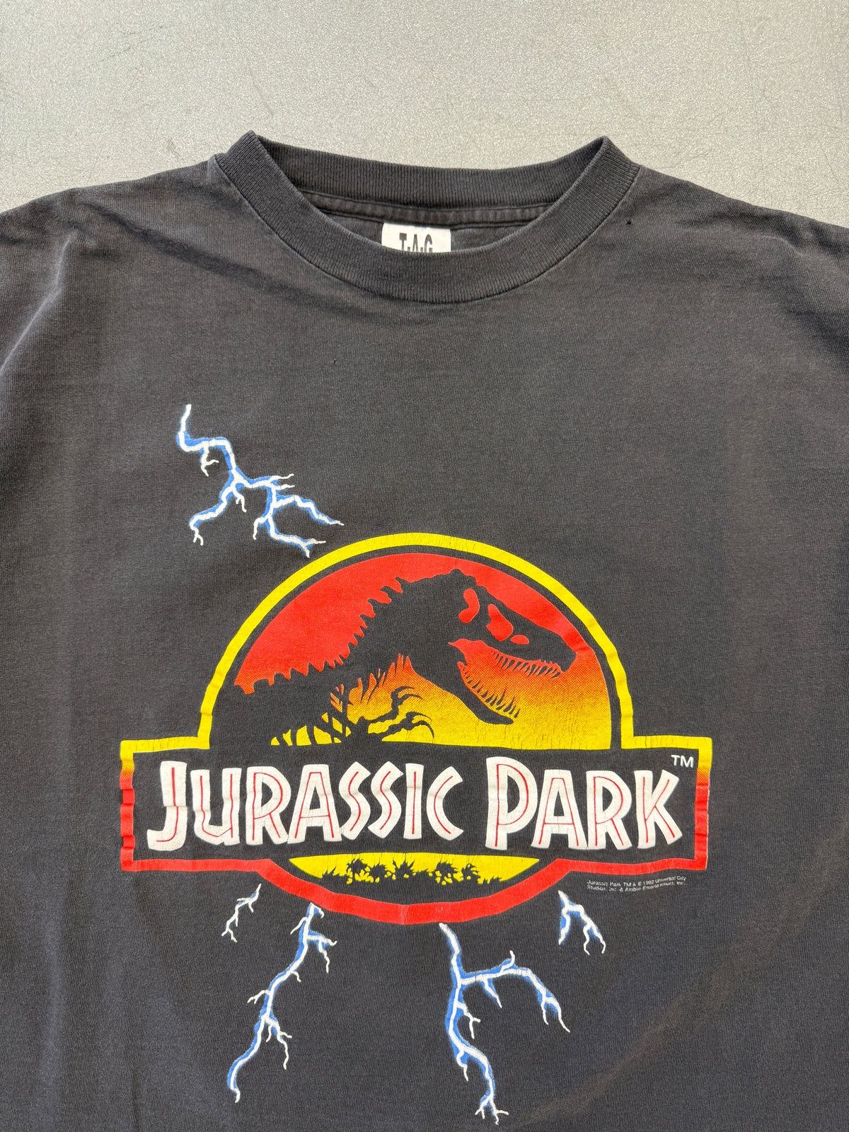 1992 JURASSIC PARK LIGHTNING TEE (T-A-G TAG)