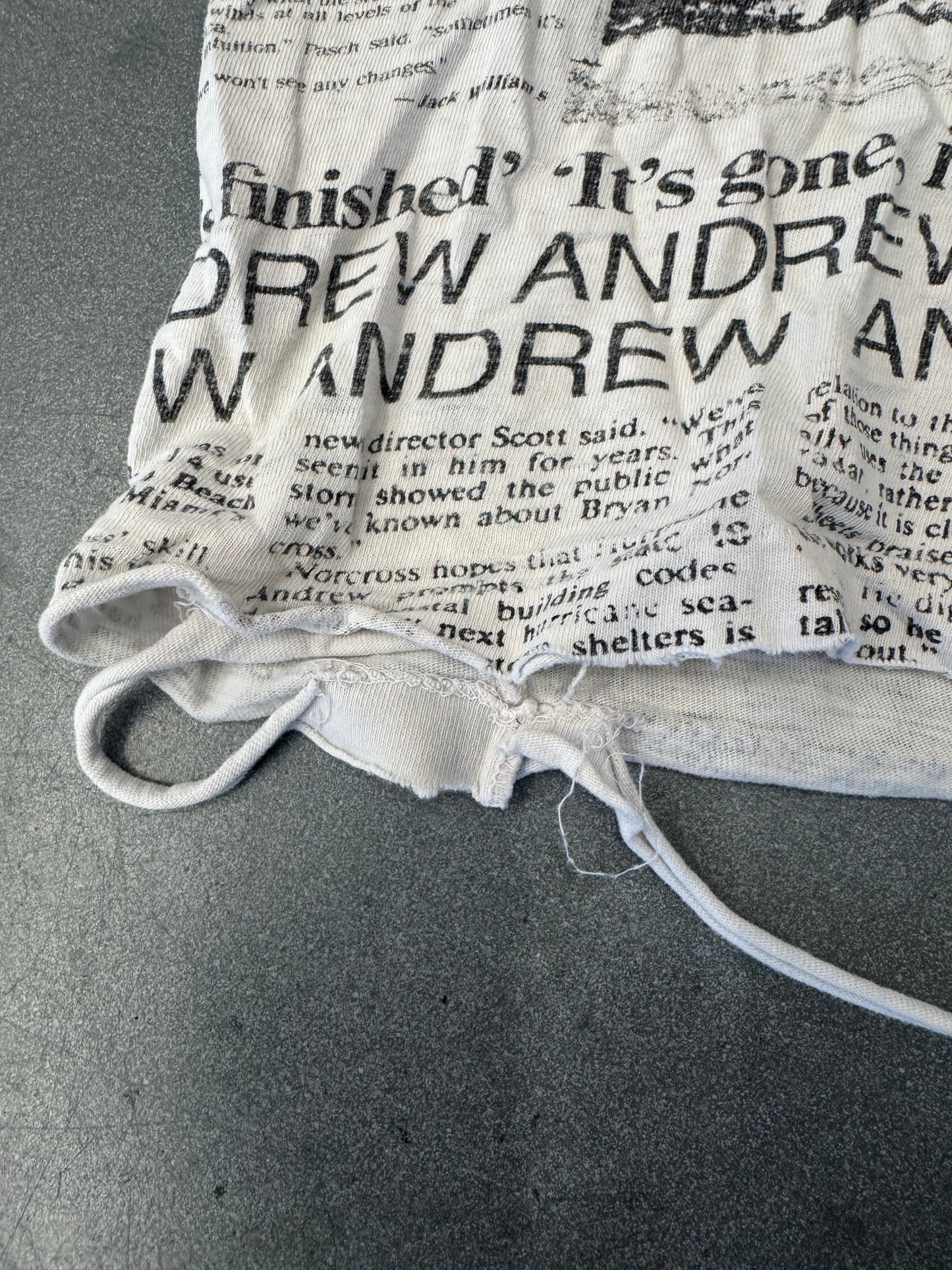 90S HURRICANE ANDREW SHREDDED NEWSPAPER TEE (FADED TAG)
