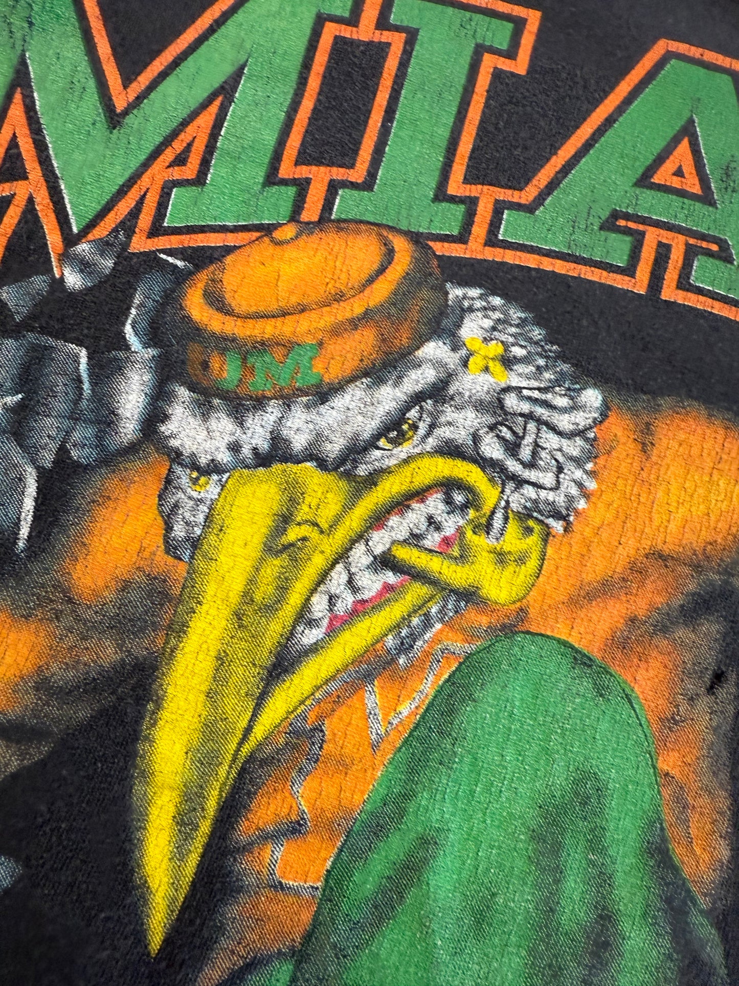 1994 MIAMI HURRICANES SEBASTIAN BASKETBALL BREAKTHROUGH SHATTERED TEE (ACTIVE IMAGE TAG)