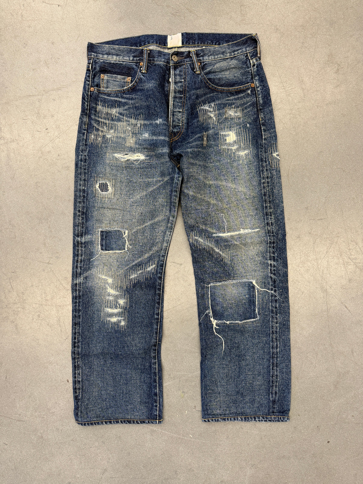 AD24 JUNYA WATANABE EYE NM DISTRESSED DENIM JEANS