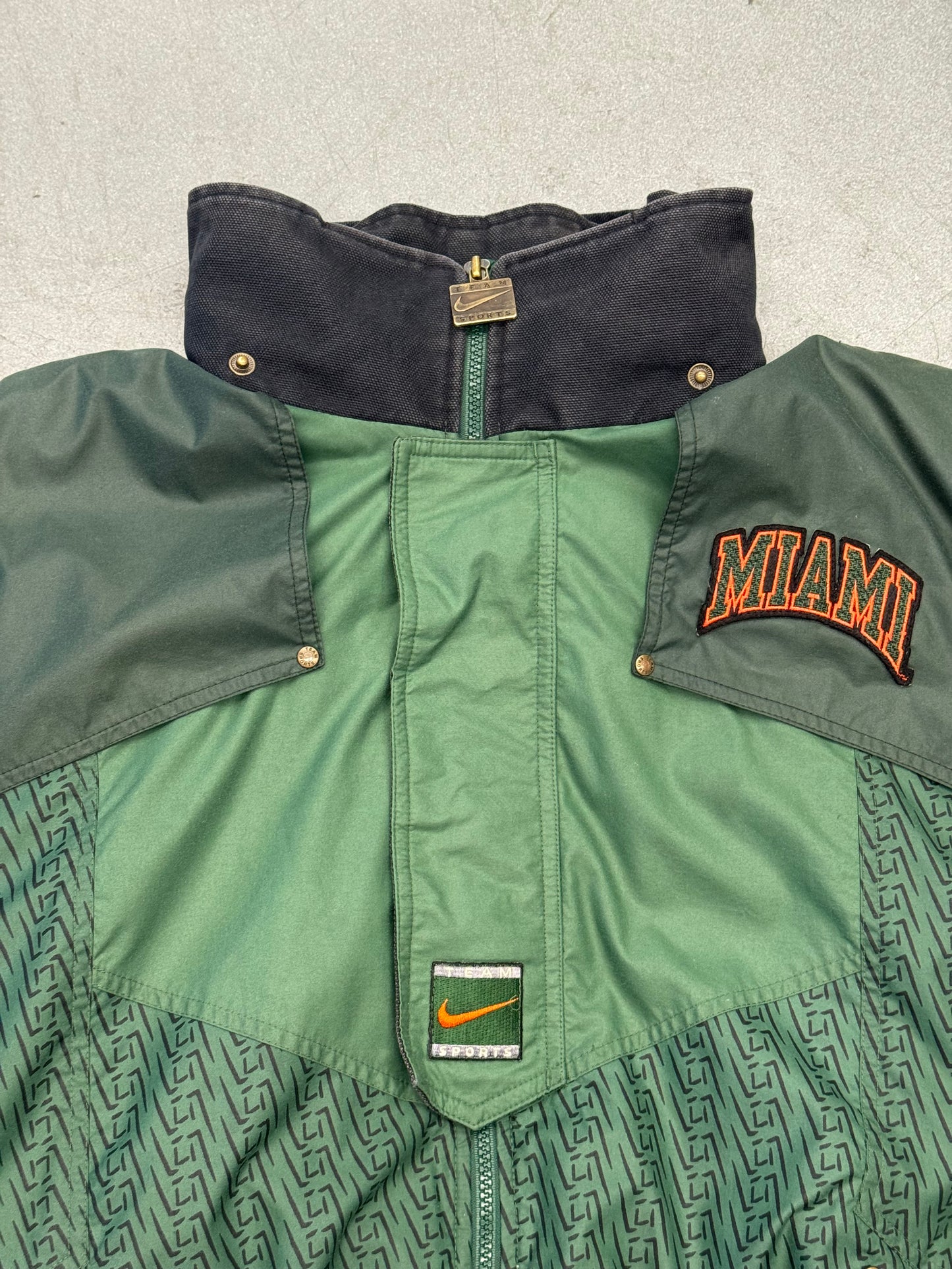90S NIKE TEAM SPORTS UNIVERSITY OF MIAMI FOOTBALL FULL ZIP DOWN JACKET