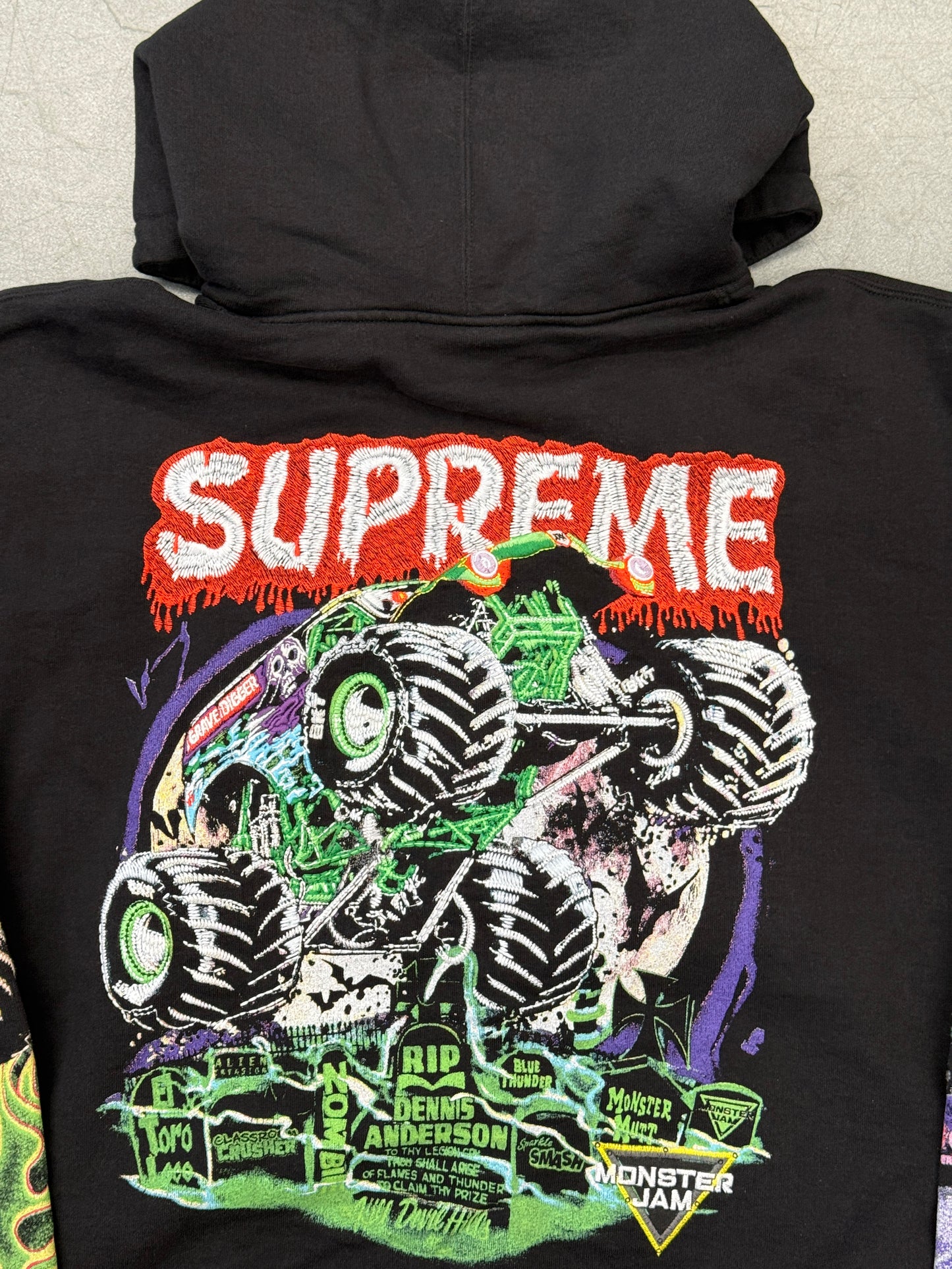 SS26 SUPREME MONSTER JAM GRAVE DIGGER GREEN/PURPLE ZIP UP HOODED SWEATSHIRT