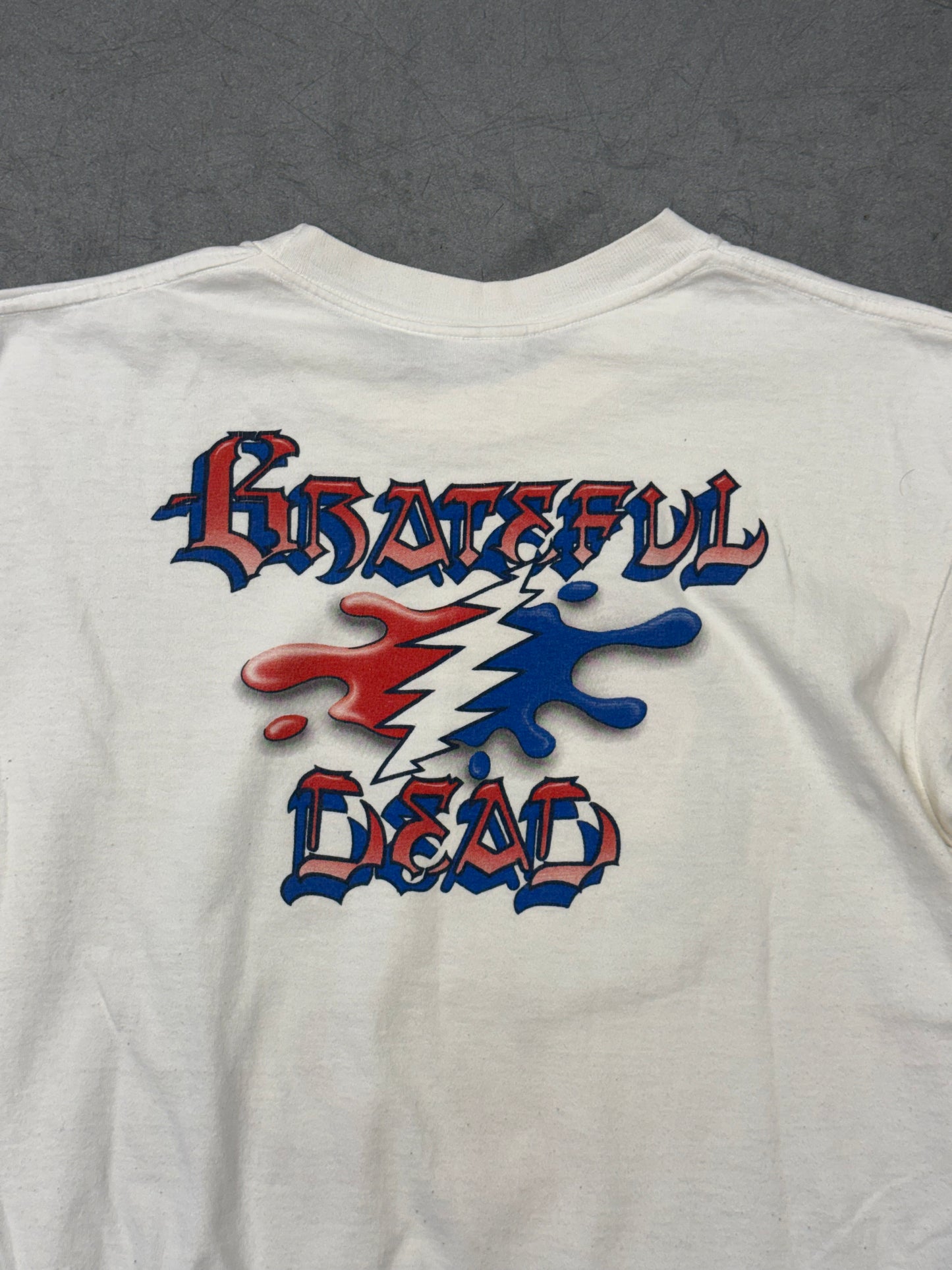 1994 GRATEFUL DEAD BUZZ PARKER MELT YOUR FACE TEE (JENSEN ACTIVEWEAR TAG)
