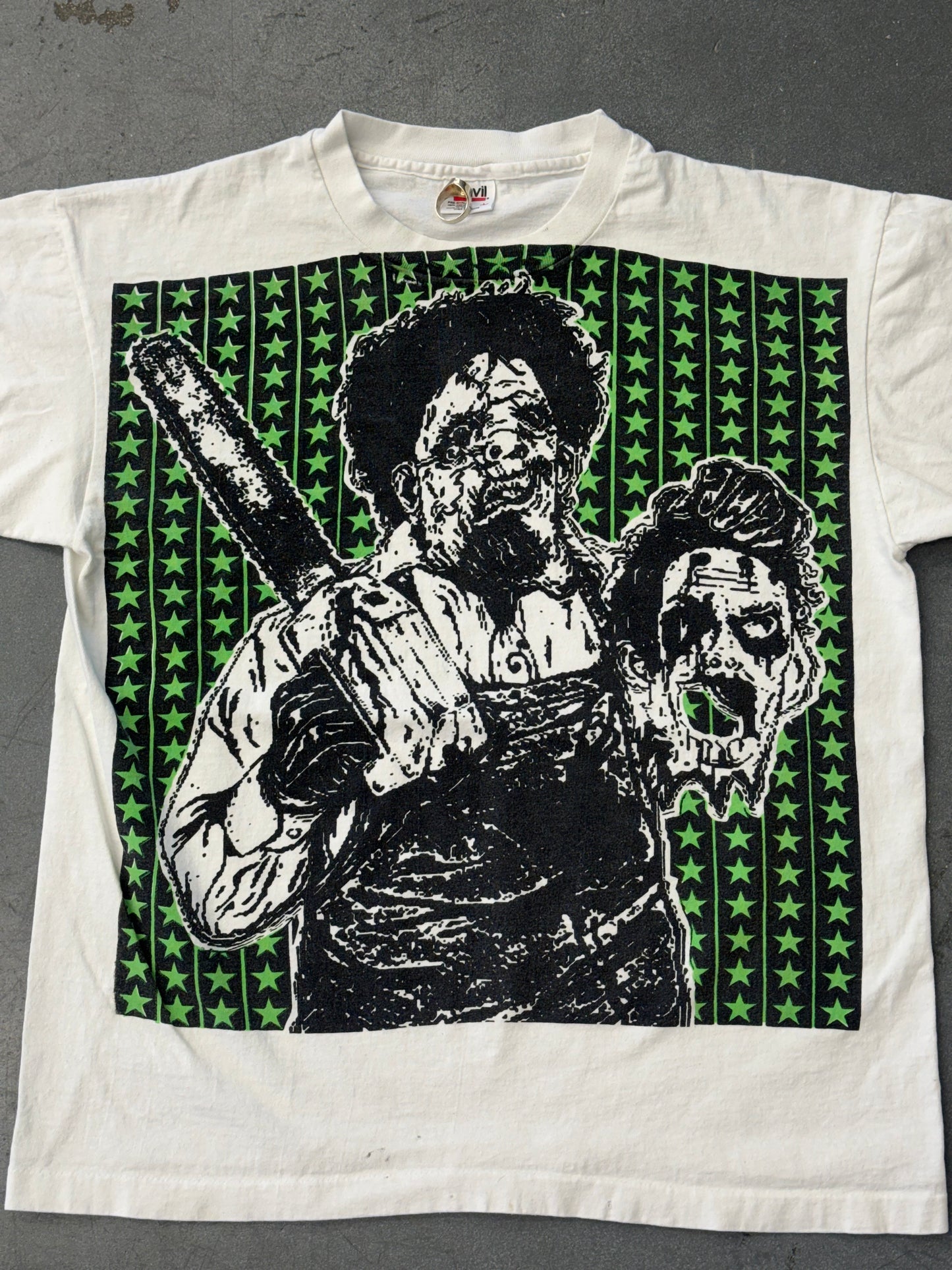 TEXAS CHAINSAW MASSACRE ED GEIN GREEN STARS JUMBO PRINT TEE (ANVIL TAG)