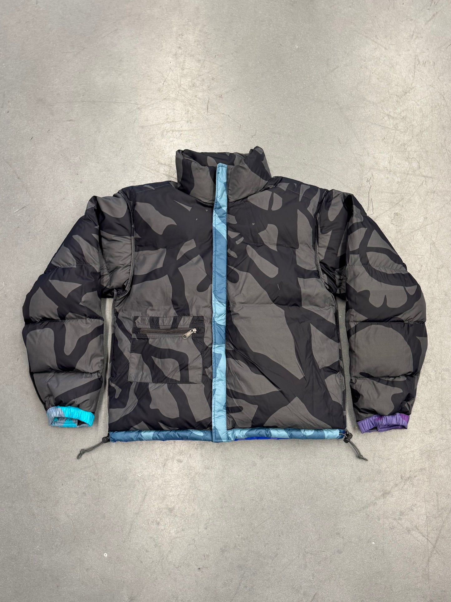 KAWS X THE NORTH FACE RETRO 1996 JACKET - MONTEREY BLUE NUPTSE PRINT