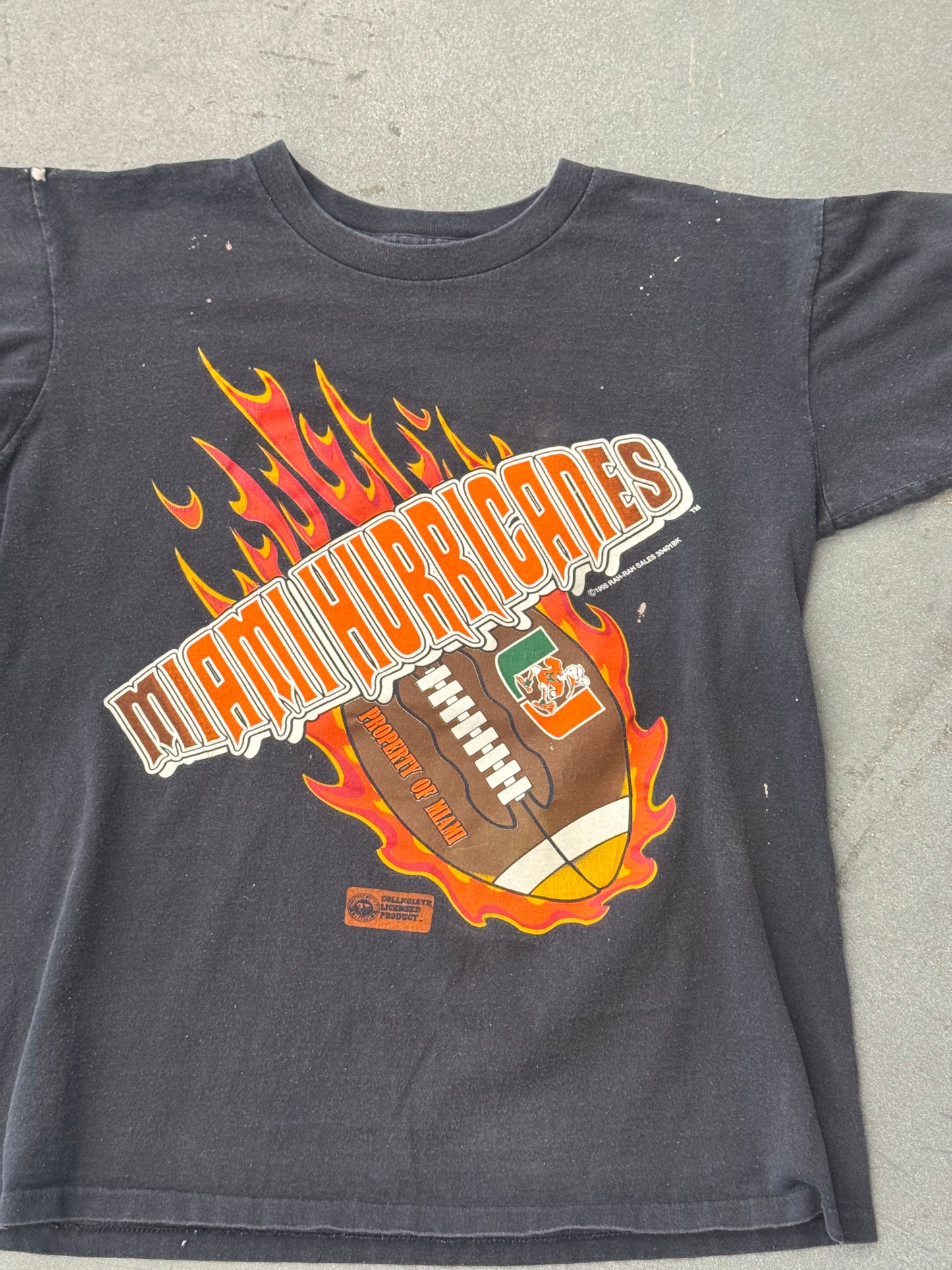 1995 MIAMI HURRICANES "PROPERTY OF MIAMI" FLAMING FOOTBALL TEE (CUT TAG)
