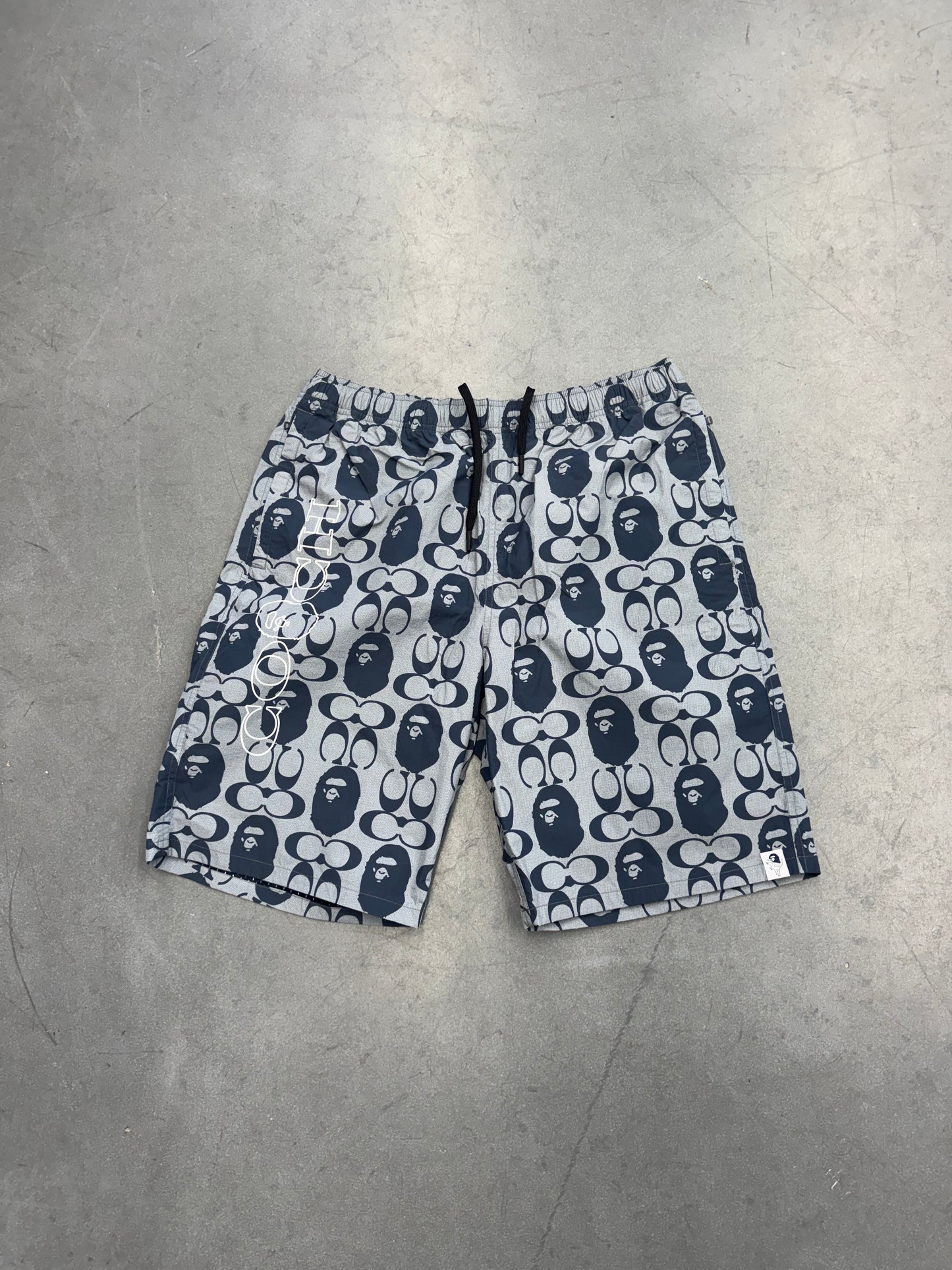 2021 BAPE X COACH SHORTS - NAVY