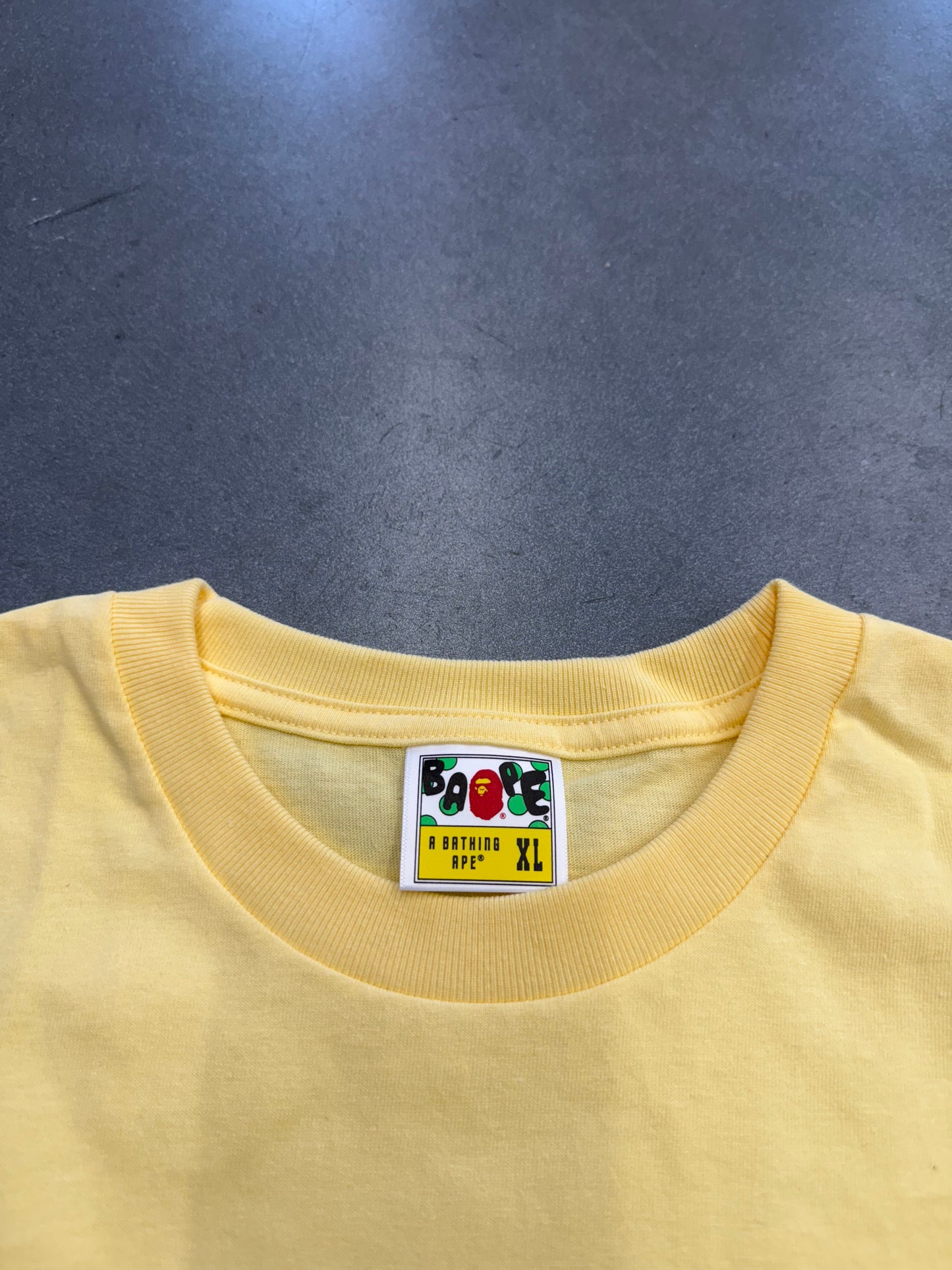 A BATHING APE COLLEGE TEE - YELLOW (XL) (NEW IN BAG)