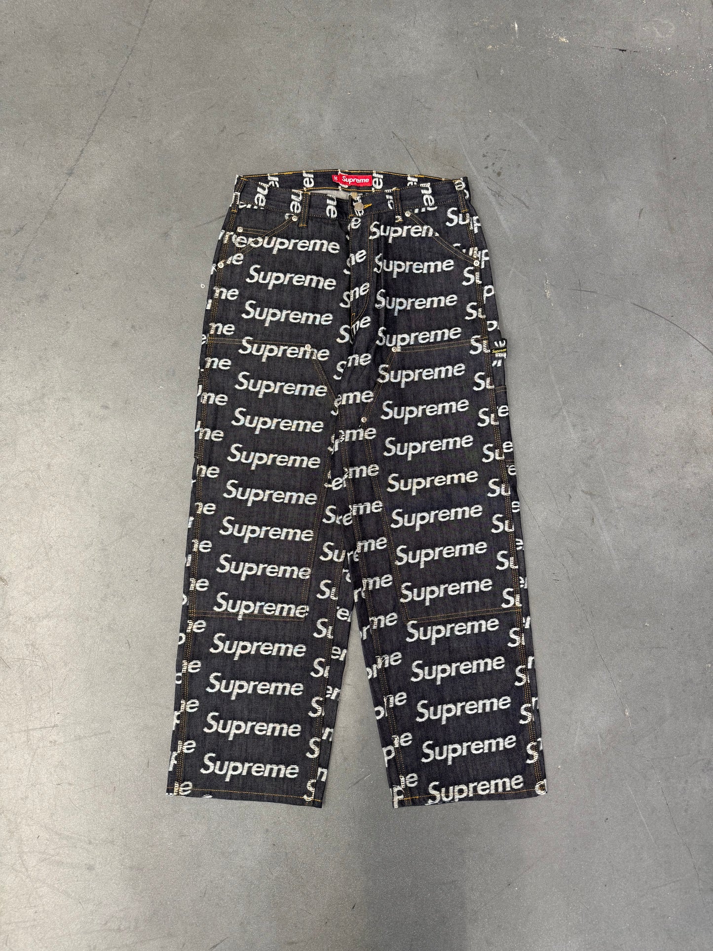 FW25 SUPREME JACQUARD LOGOS DOUBLE KNEE DENIM PAINTER JEAN - RIGID INDIGO