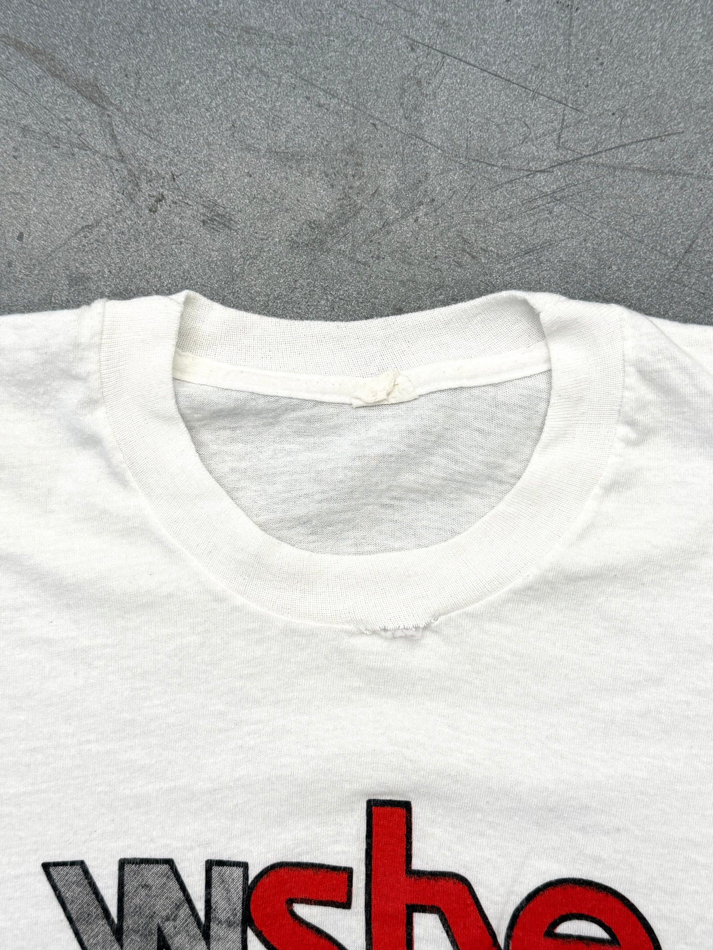 ‘80S WSHE SHE'S ONLY ROCK 'N ROLL PROMOTIONAL TEE (FADED TAG)