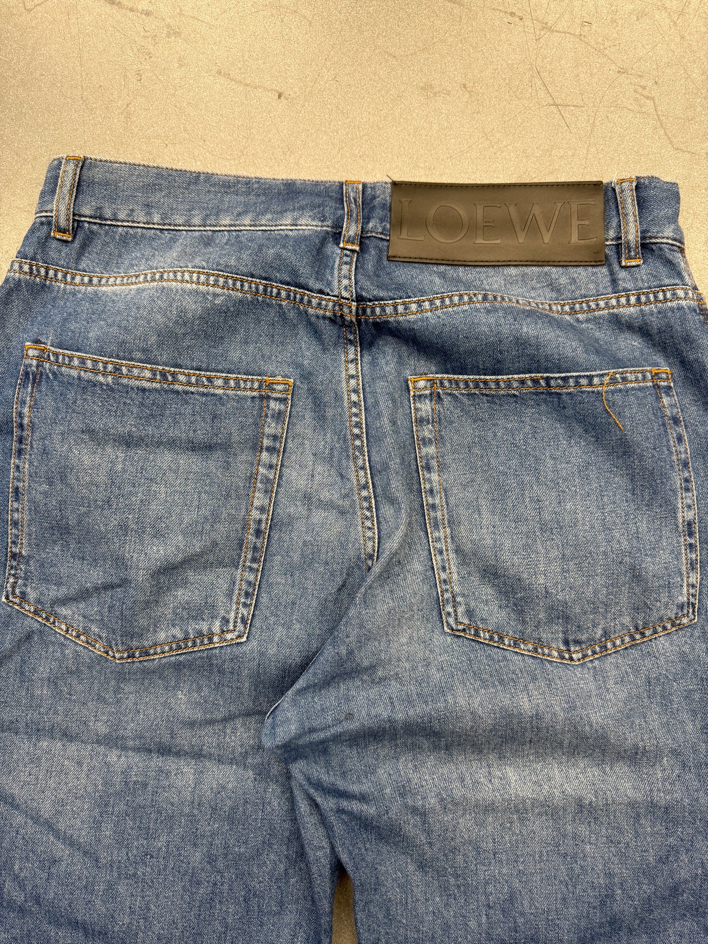 LOEWE MENS DISTRESSED KNEE JEANS