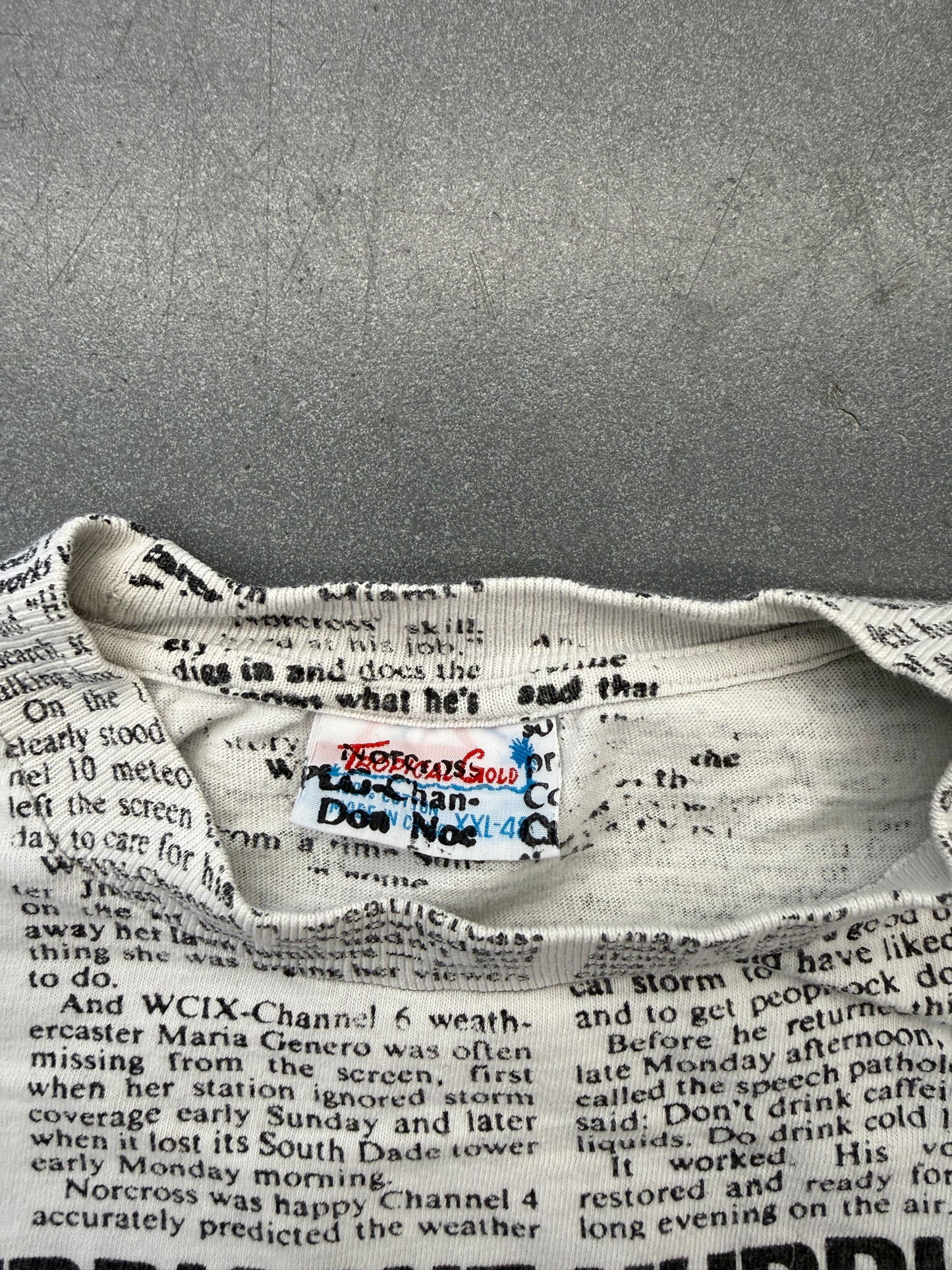 1992 HURRICANE ANDREW NEWSPAPER AOP TEE (TROPICAL GOLD TAG)