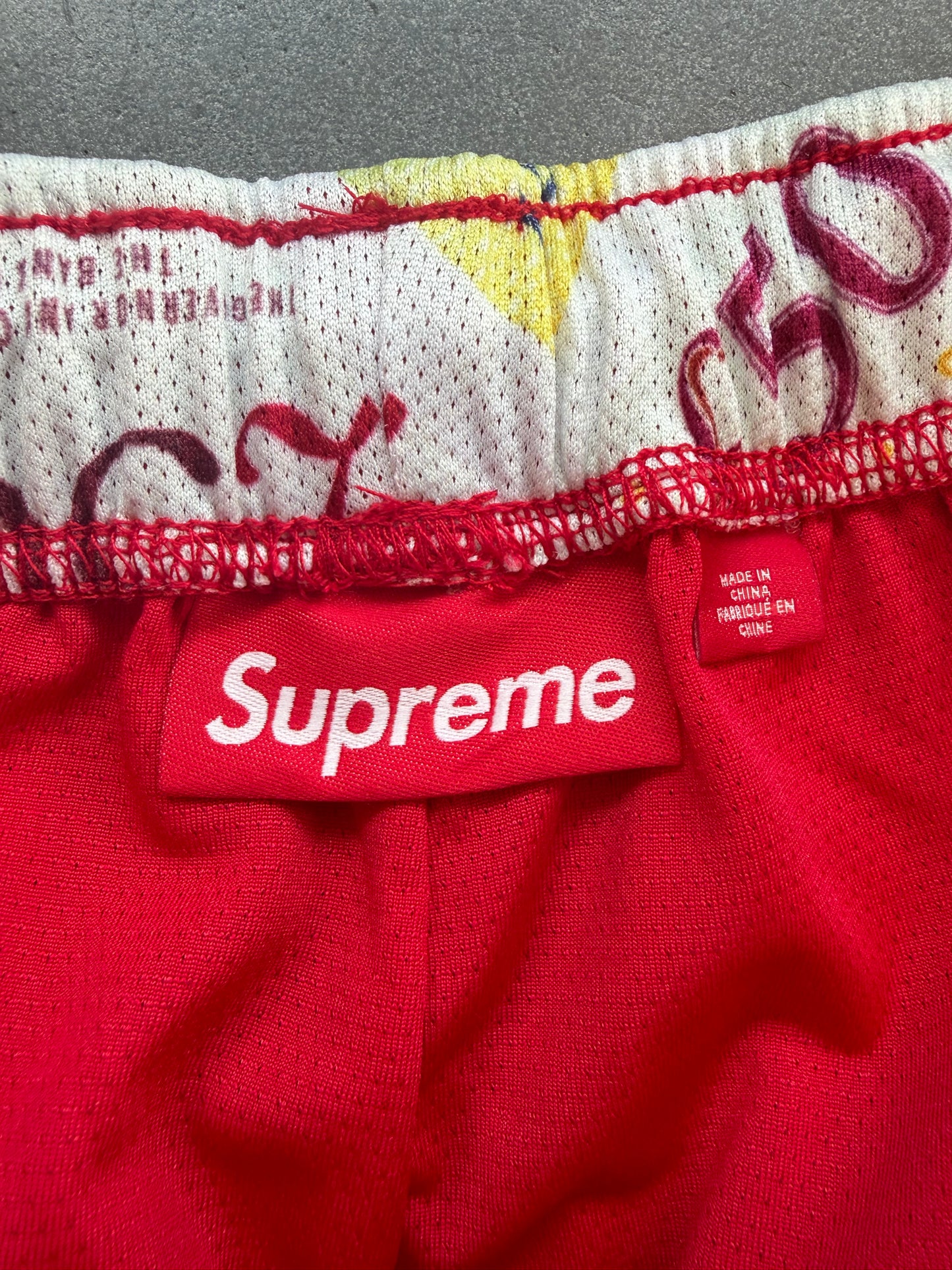 FW25 SUPREME POUNDS SOCCER SHORT - RED