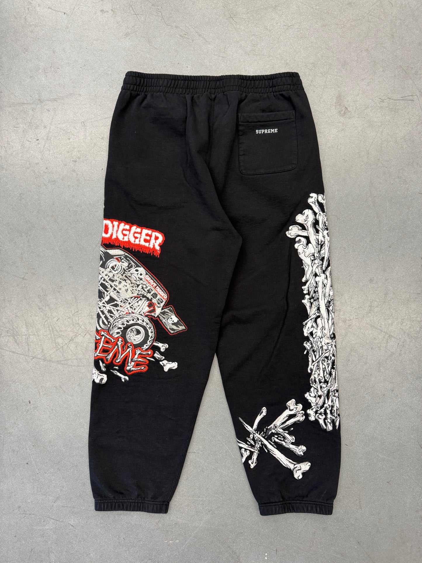 SS26 SUPREME MONSTER JAM GRAVE DIGGER BONES SWEATPANTS