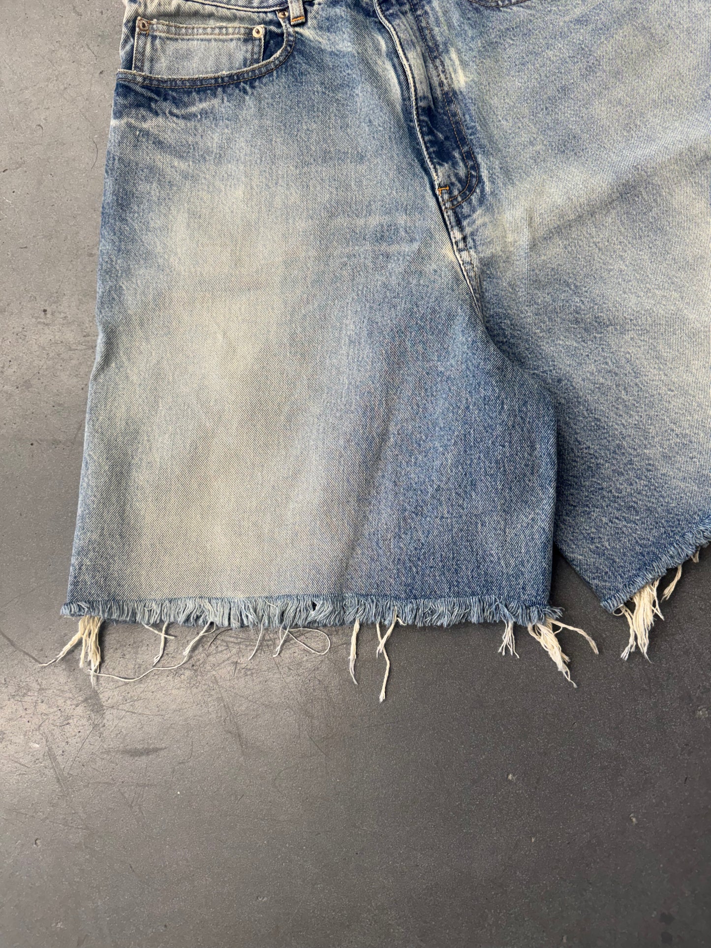 BALENCIAGA SKATER WIDE-LEG DISTRESSED DENIM SHORTS