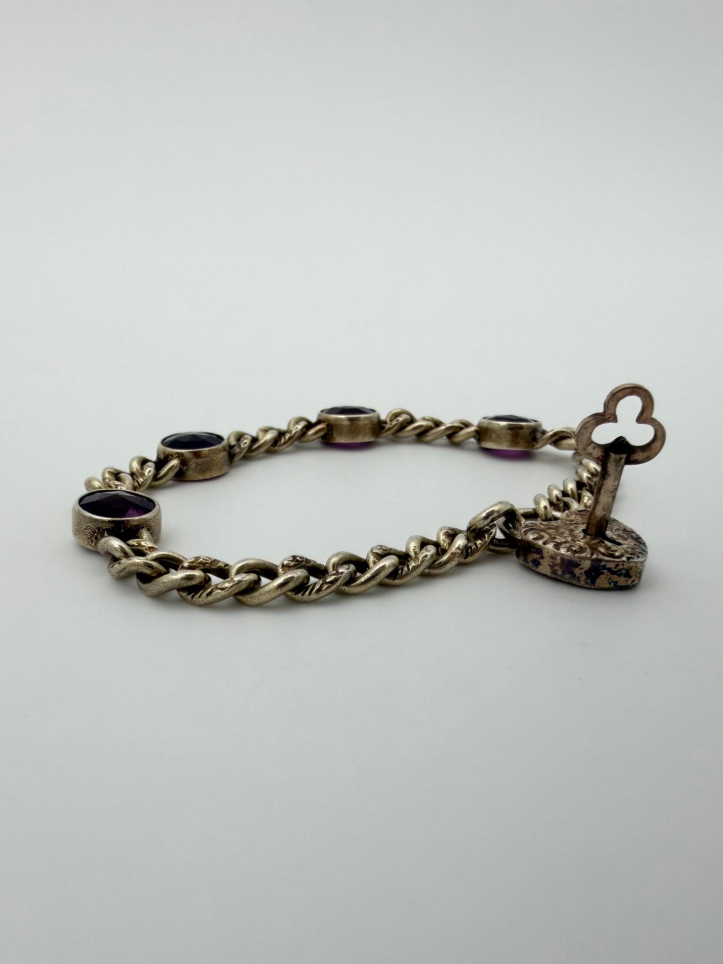 1800S VICTORIAN ERA PURPLE AMETHYST HEART LOCK WITH KEY SILVER BRACELET (13.5 GRAMS)