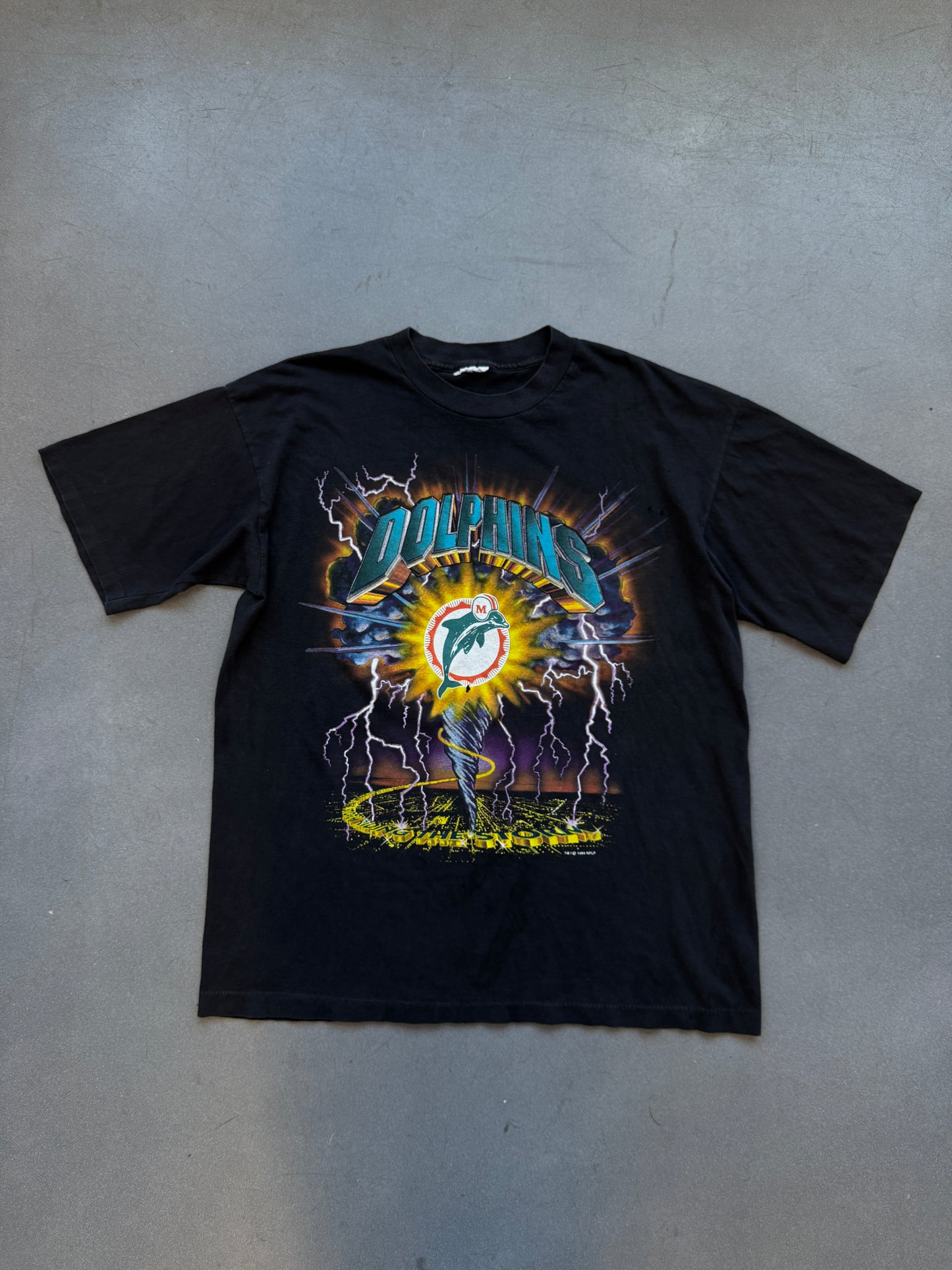 1994 MIAMI DOLPHINS LIGHTNING RIDING THE STORM TEE (PULLED TAG)