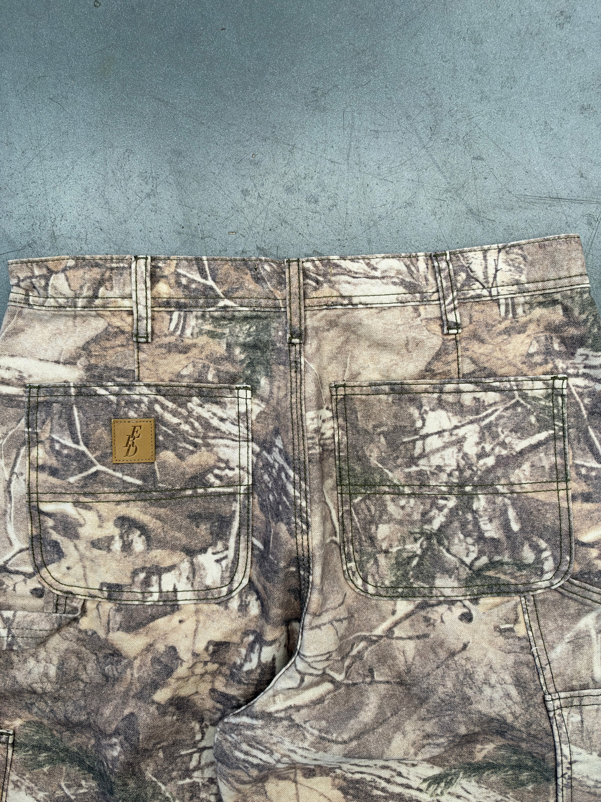 FW23 ENFANTS RICHES DEPRIMES REALTREE CAMO CARPENTER PANTS
