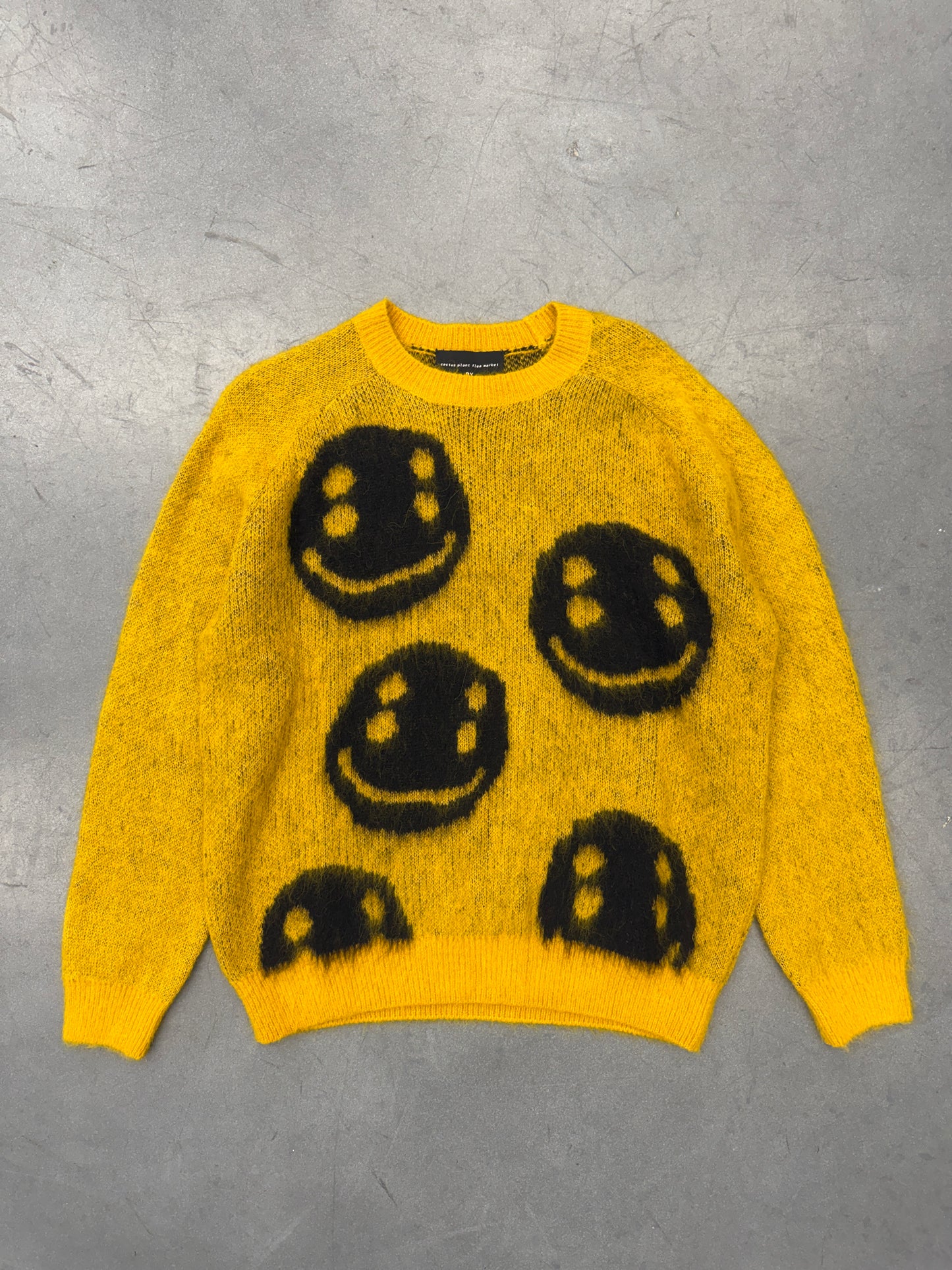 CACTUS PLANT FLEA MARKET MARC JACOBS SMILEY FACE SWEATER