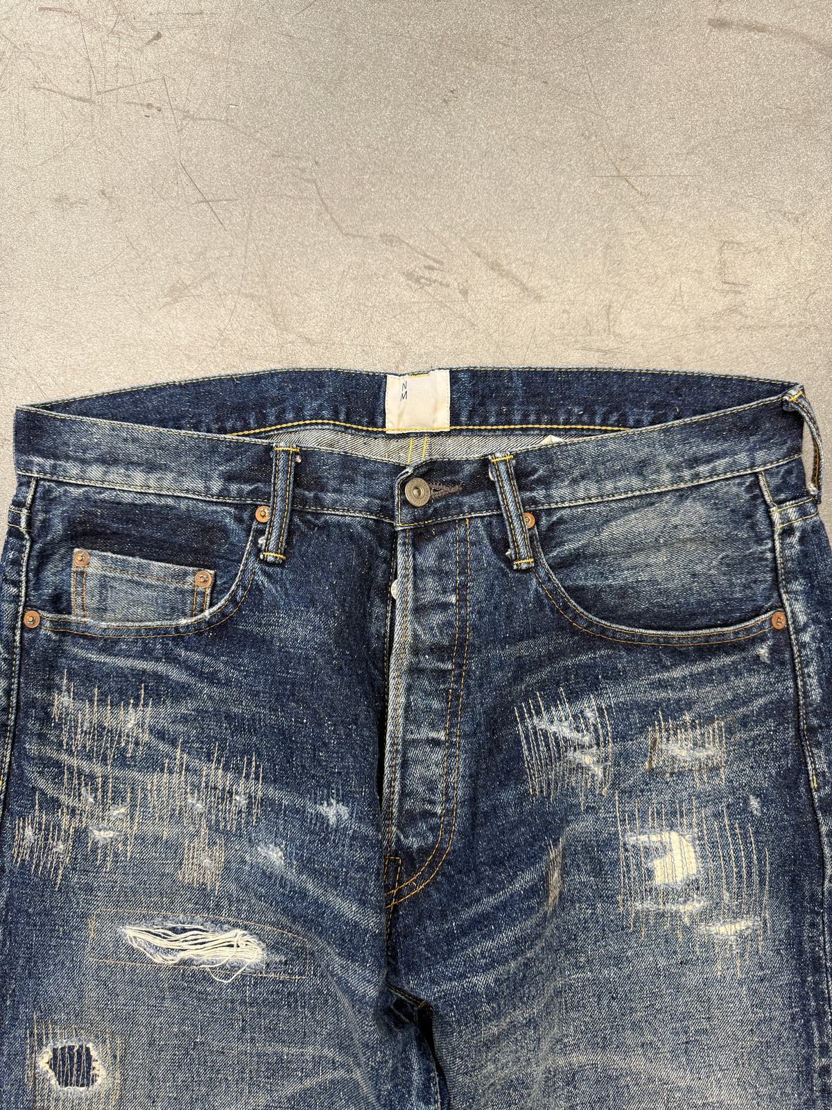 AD24 JUNYA WATANABE EYE NM DISTRESSED DENIM JEANS