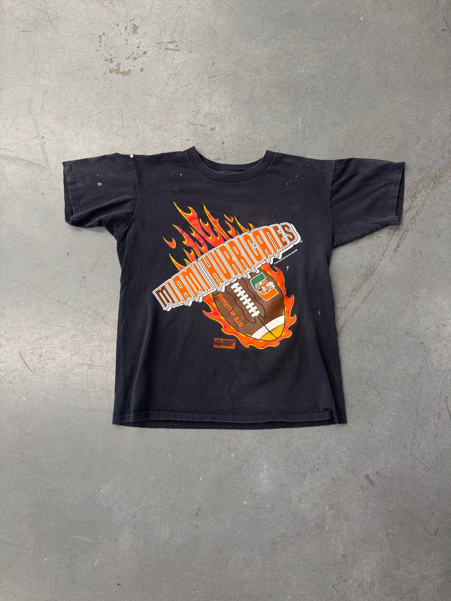 1995 MIAMI HURRICANES "PROPERTY OF MIAMI" FLAMING FOOTBALL TEE (CUT TAG)