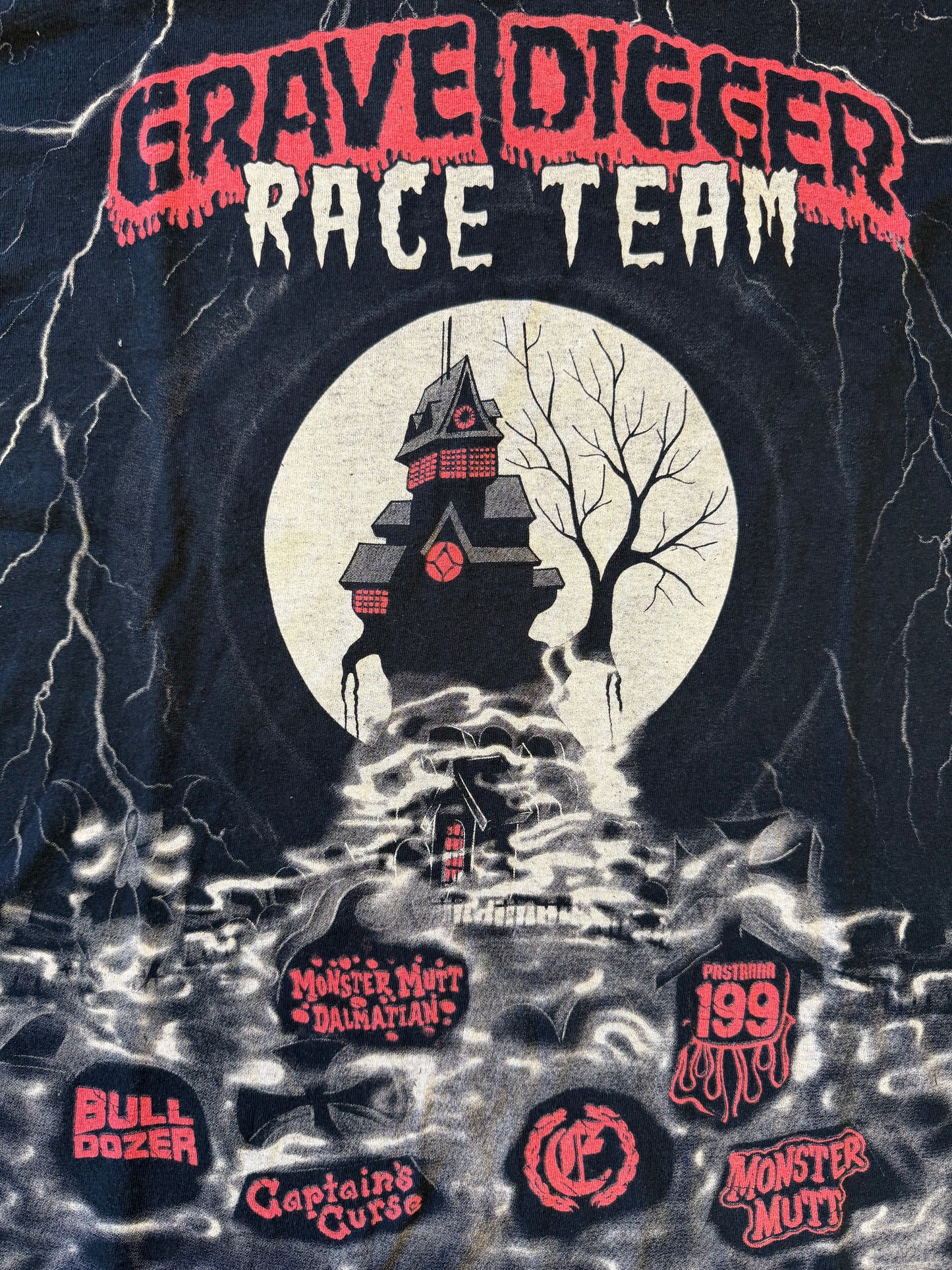 2000'S AOP GRAVE DIGGER RACE TEAM LS TEE (GILDAN HEAVY TAG)