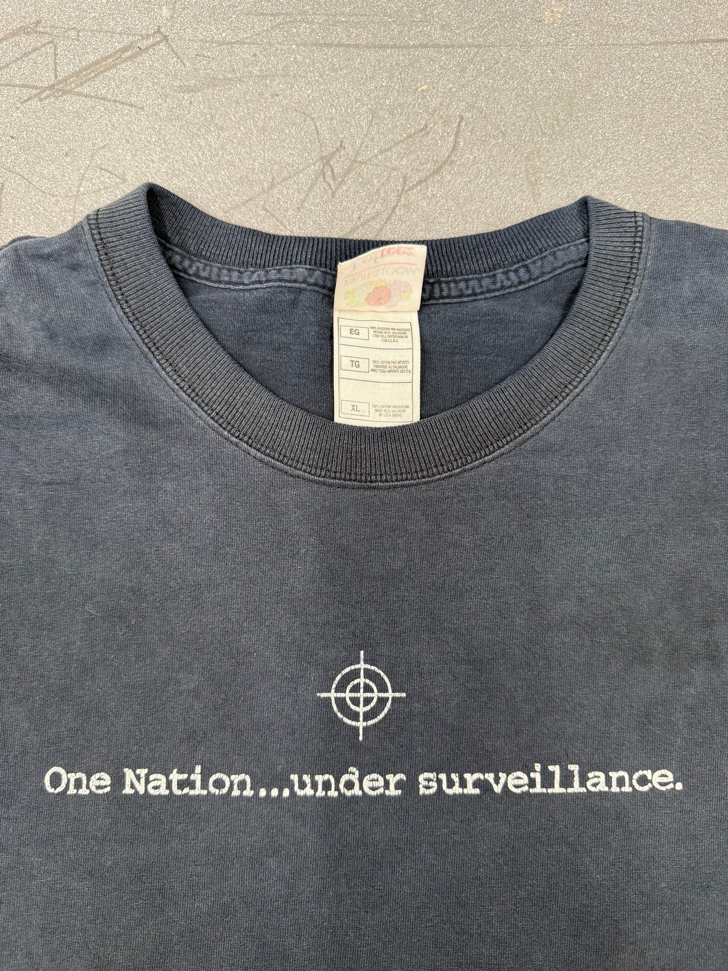 2000'S ONE NATION... UNDER SURVEILLANCE TEE (FOTL TAG)